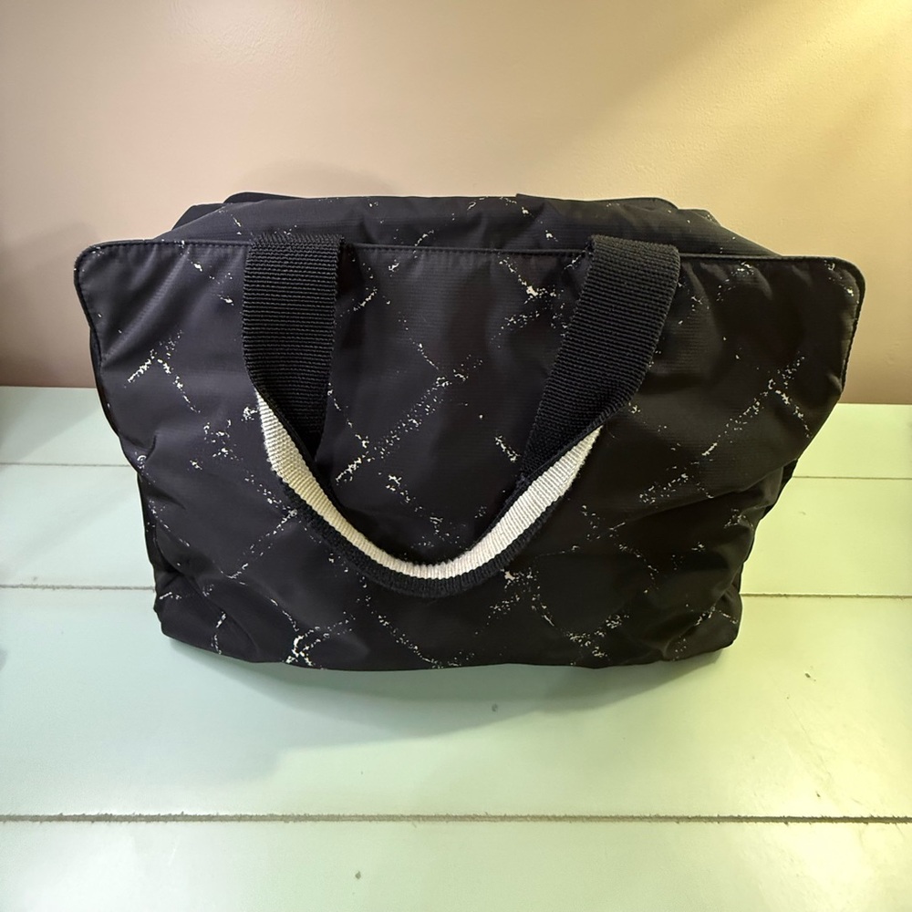 Chanel travel line weekend size/diaper bag with internal pouch and soft sac/mat.